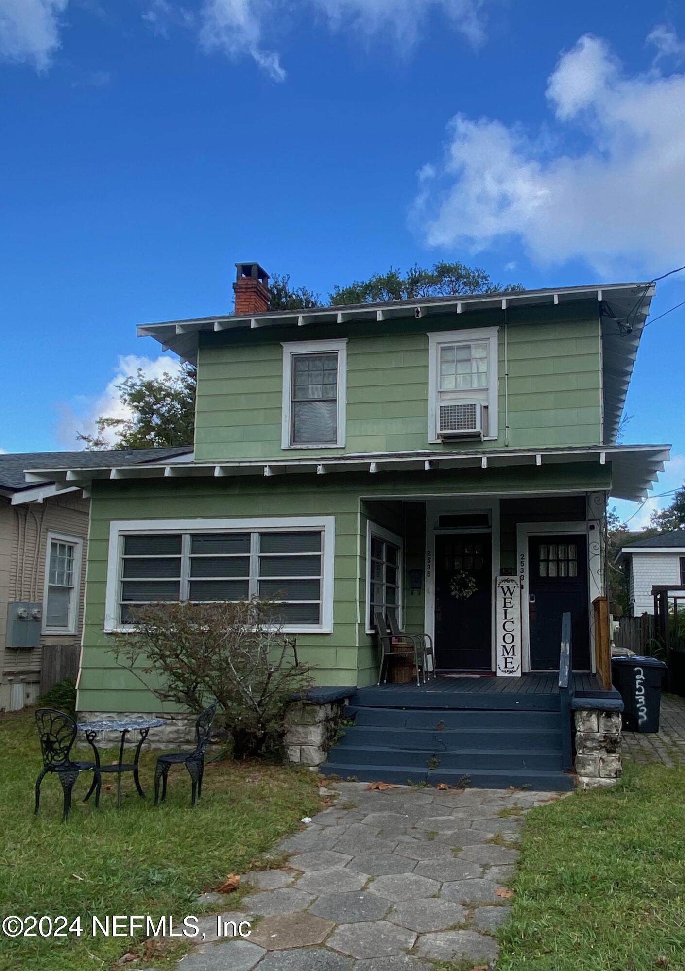 a view of a house with a patio