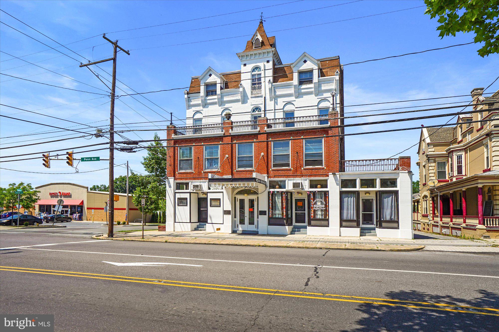 a view of a building and a street