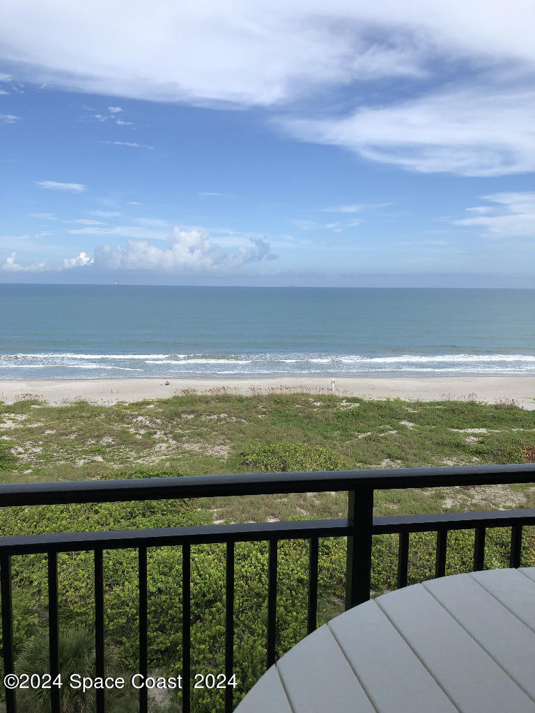 a view of ocean from a balcony