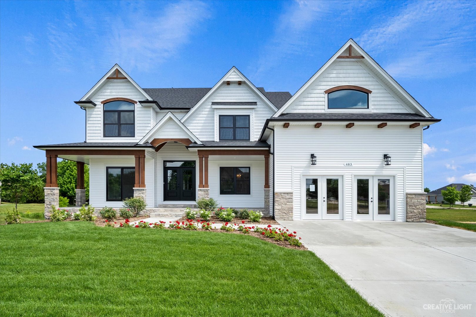 front view of a house with a yard