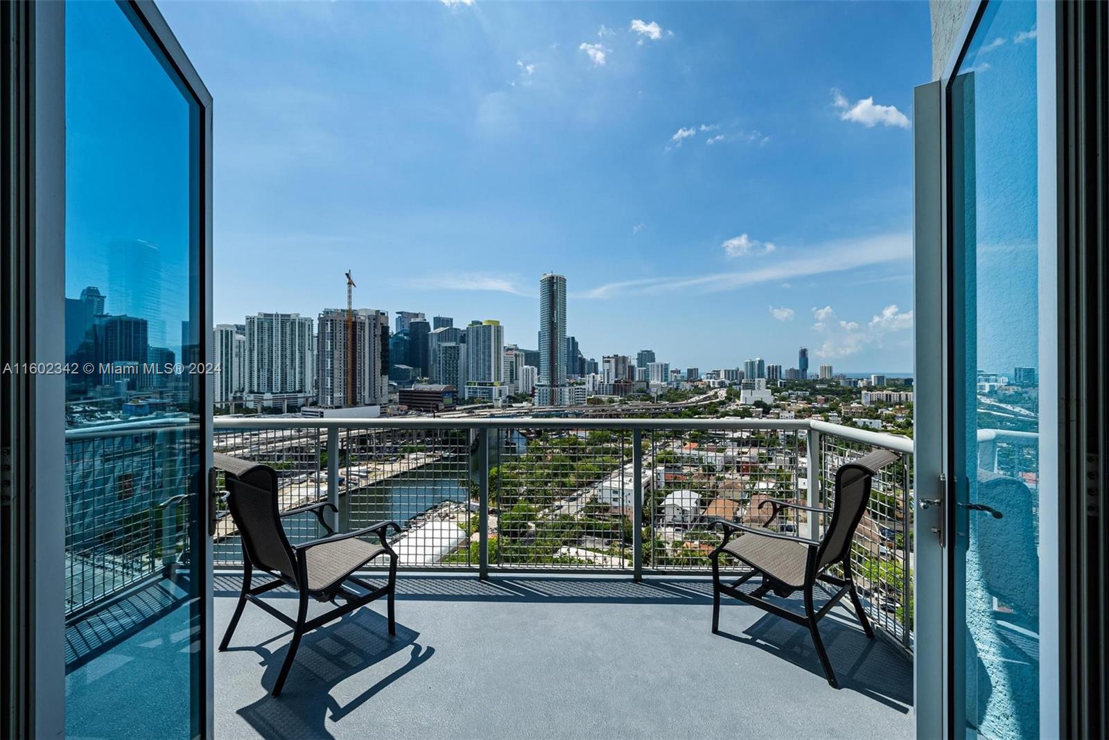 a view of a balcony with chairs