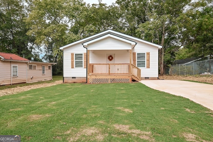 a view of a backyard with a garden