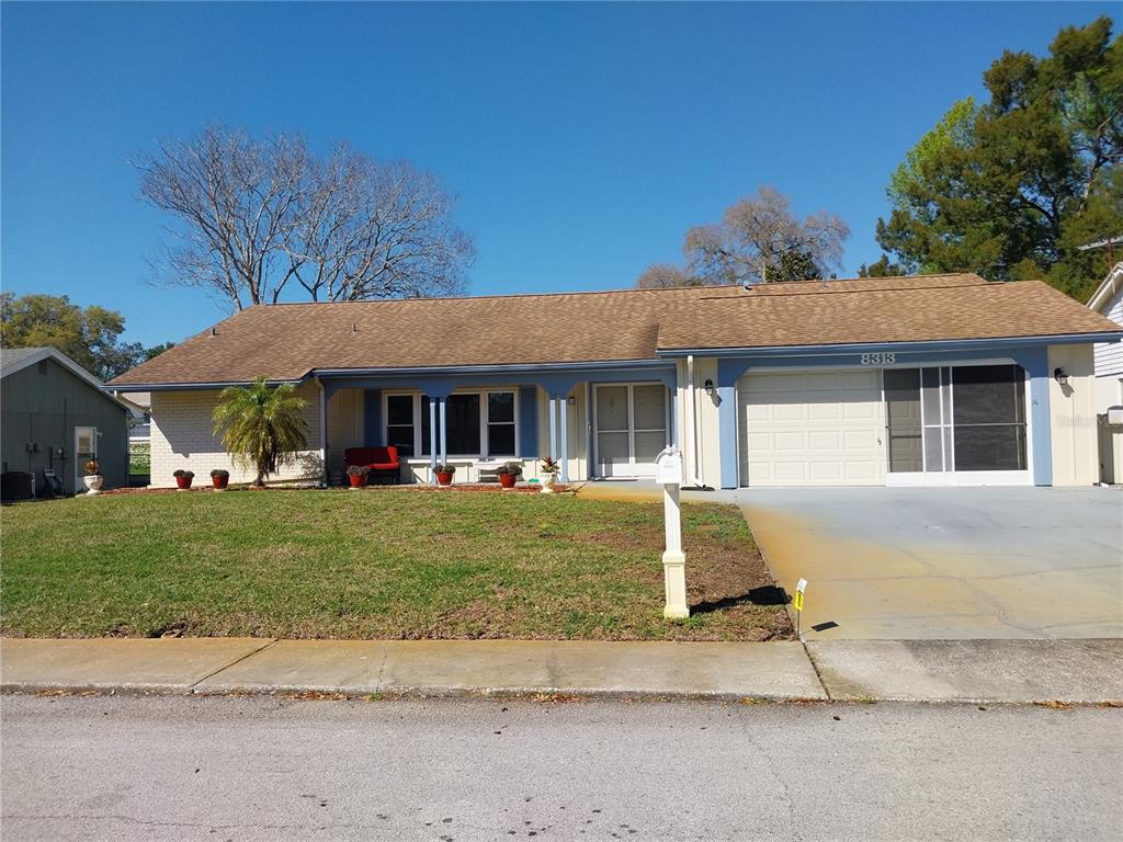 front view of a house with a yard