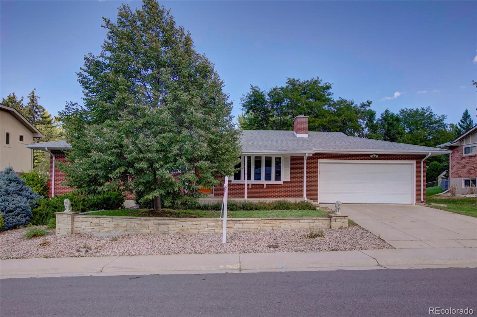 front view of a house with a street