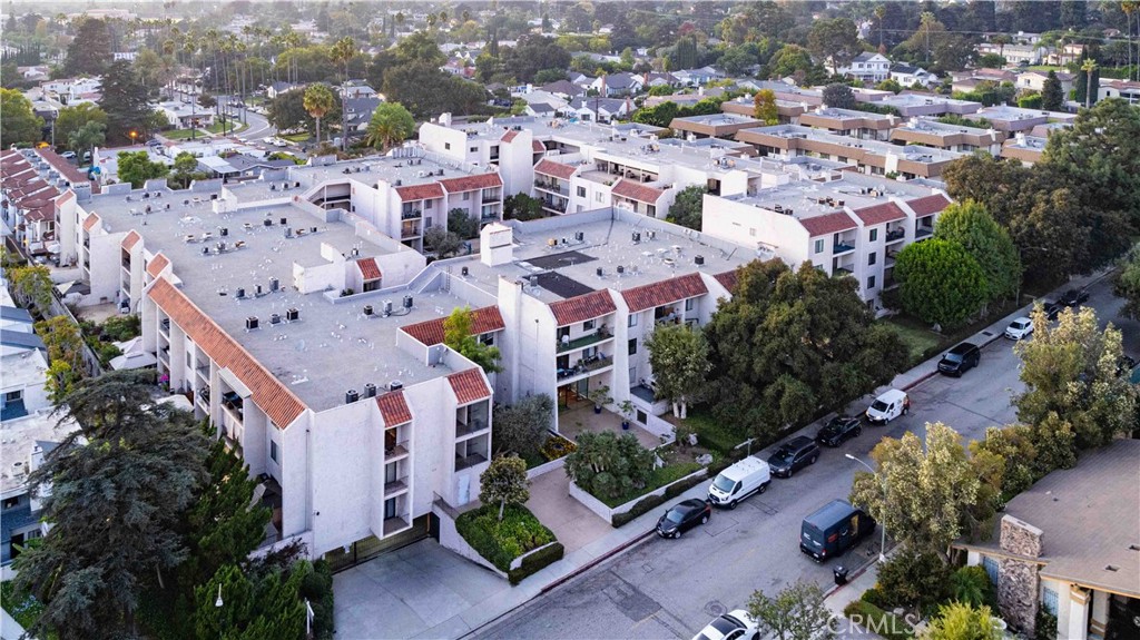 an aerial view of a city with lots of residential buildings