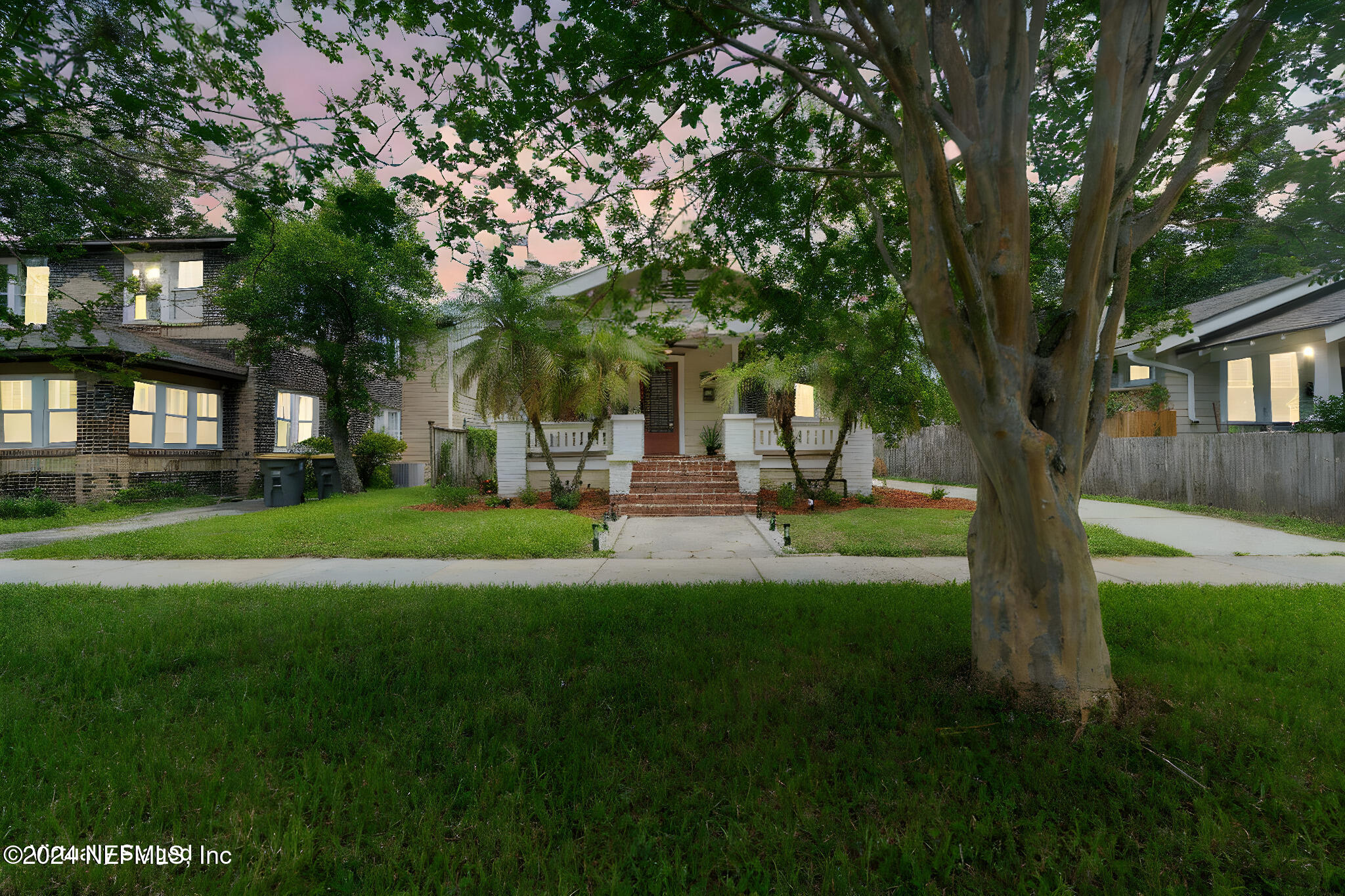 a garden view with a fountain