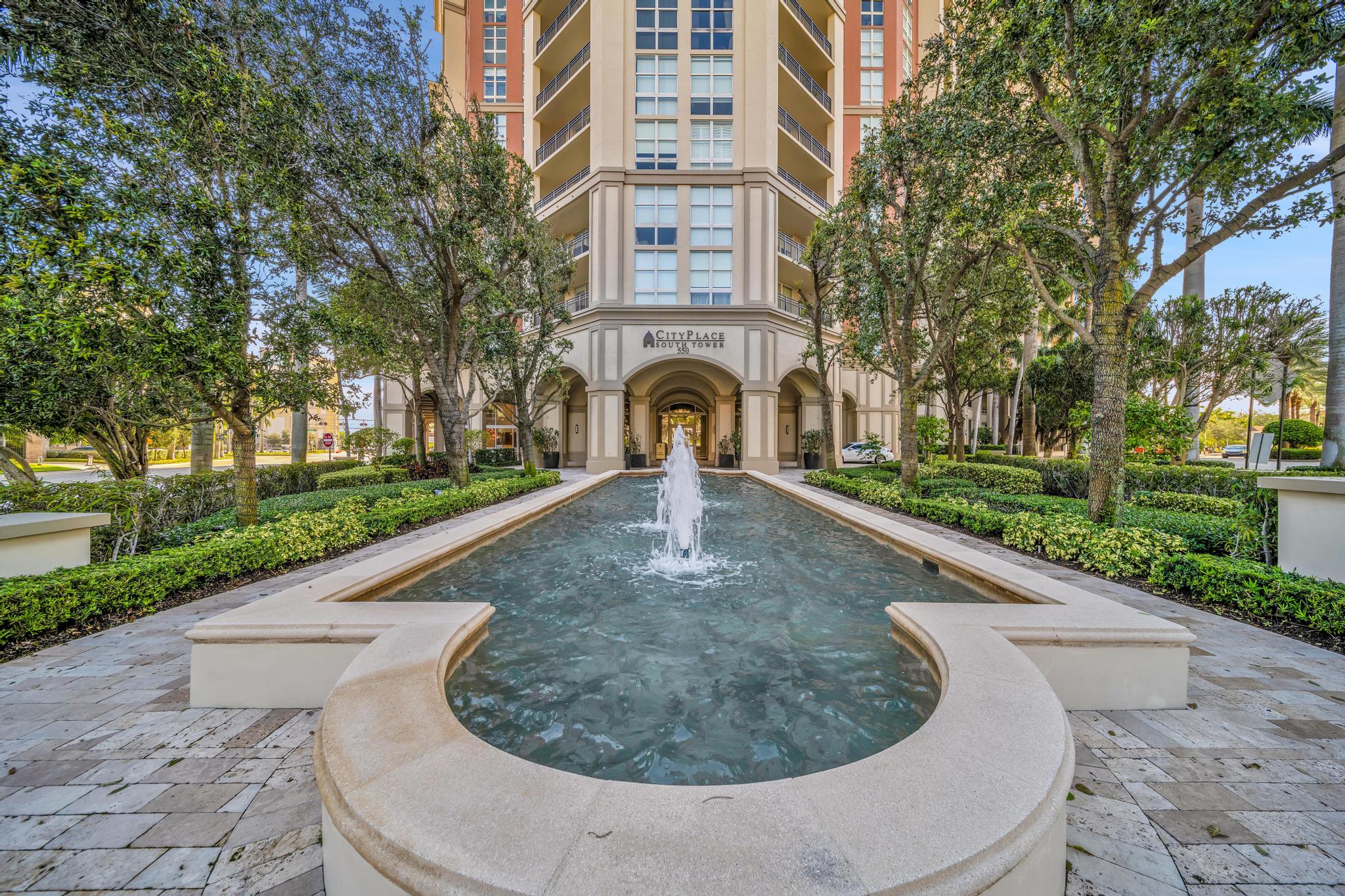 a view of a fountain in the garden