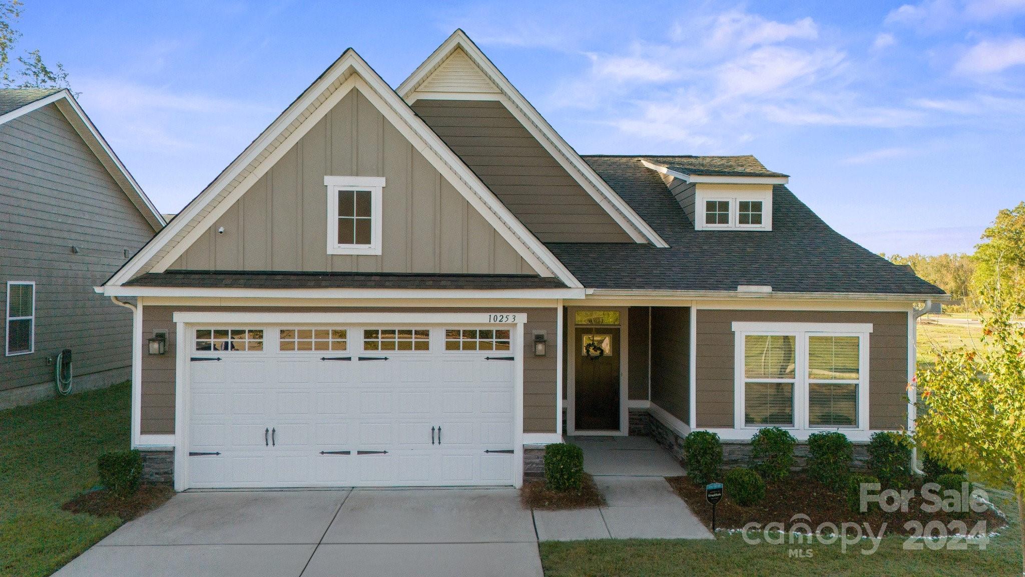 a view of a house with garage