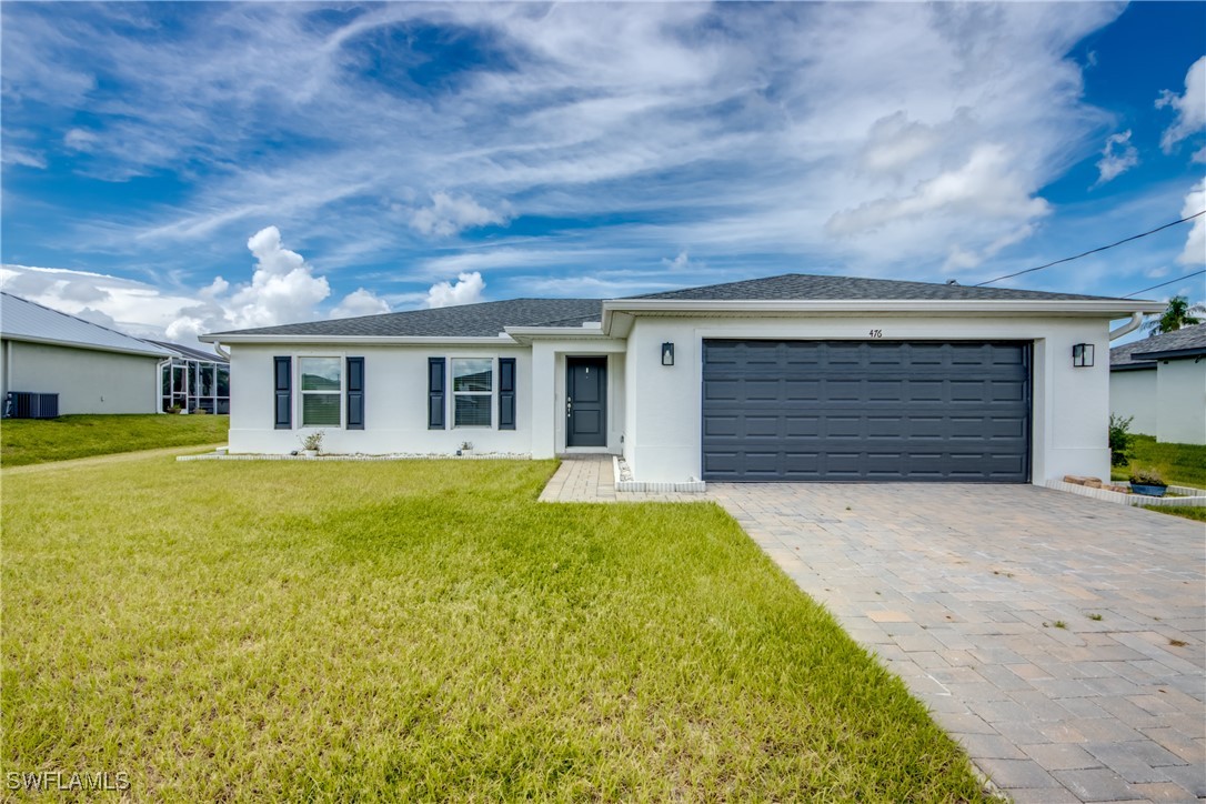 a front view of house with yard