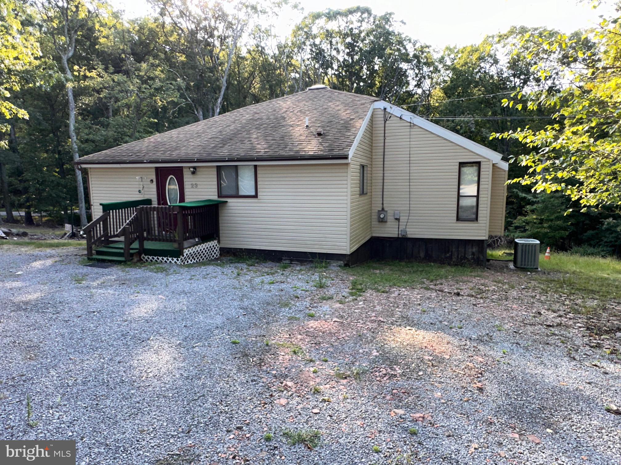 a house with trees in the background