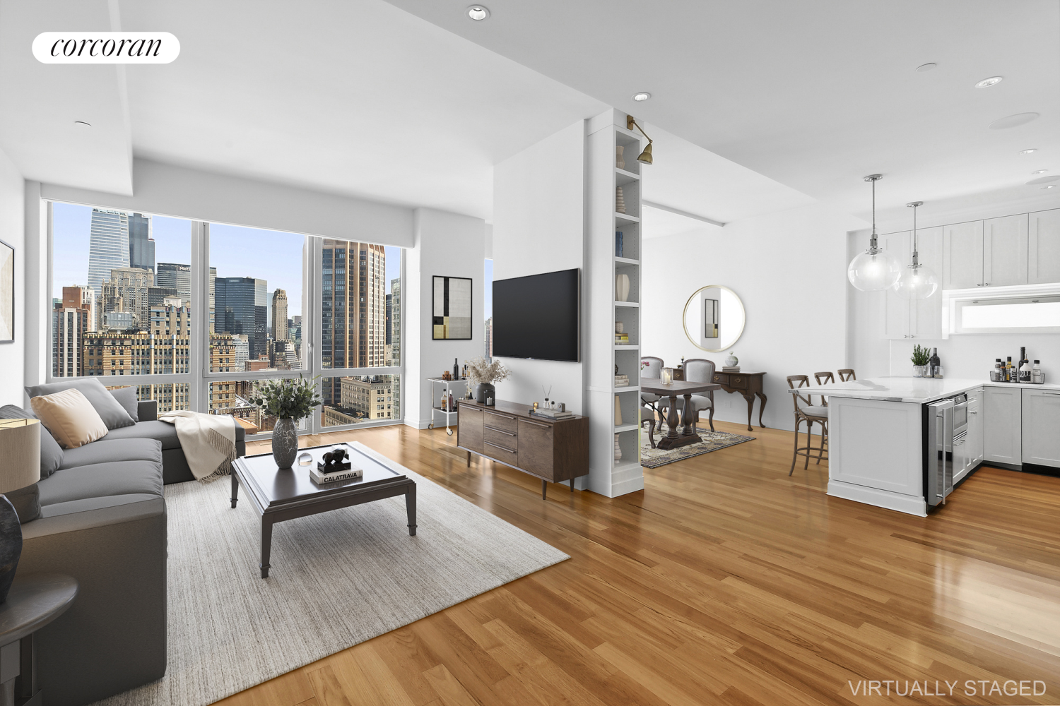 a living room with furniture flat screen tv and wooden floor