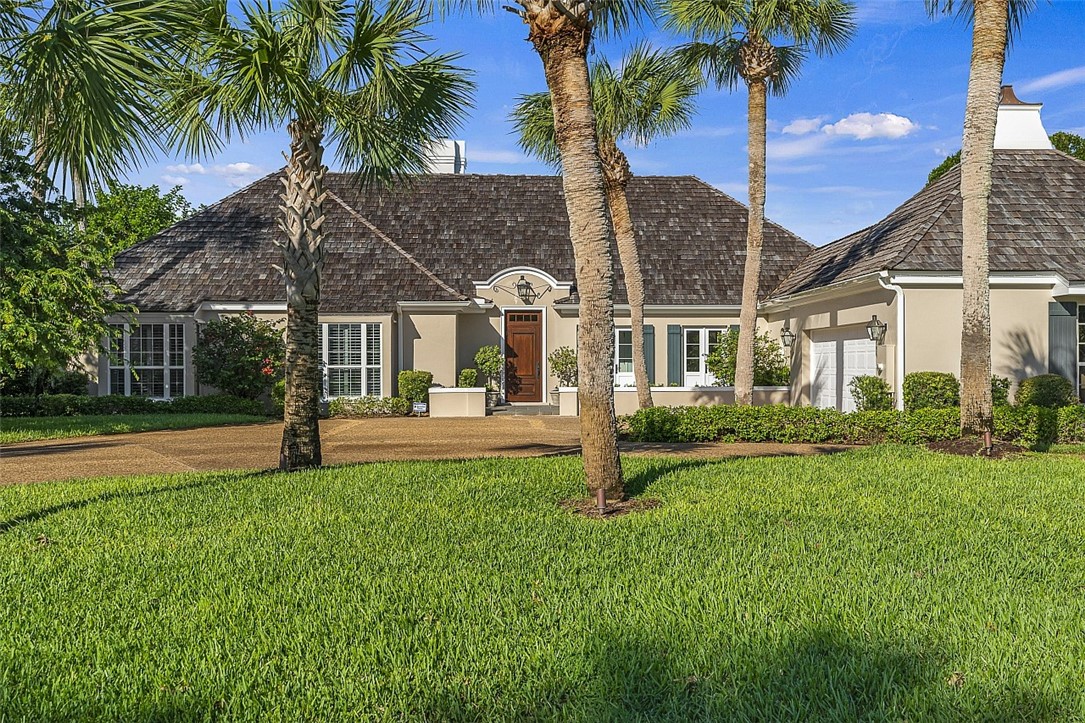 a house view with a garden space