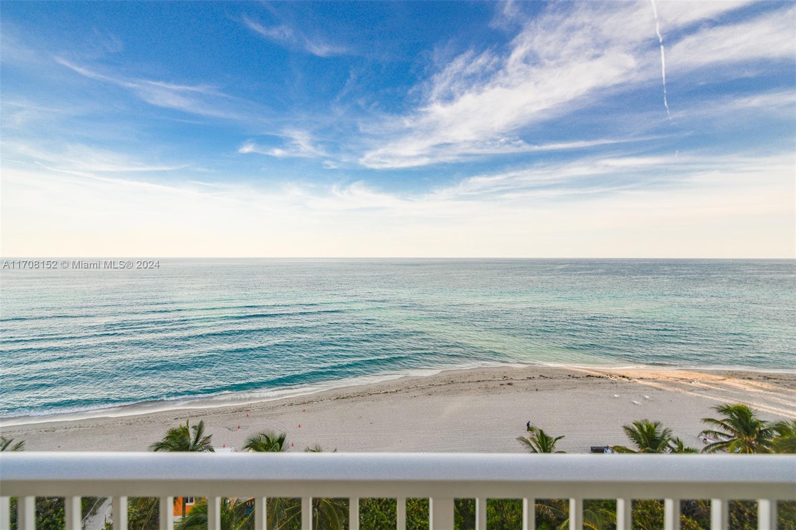 a view of an ocean from a balcony