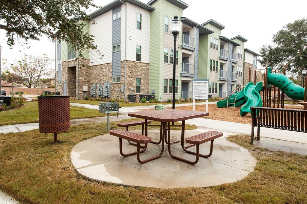 a swimming pool with outdoor seating