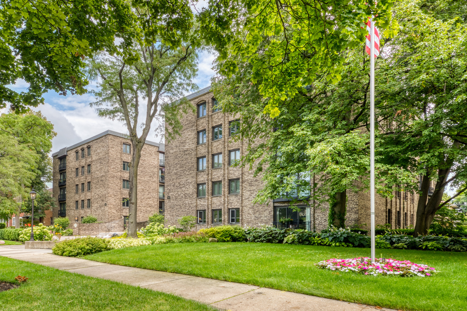 a view of a building with a yard