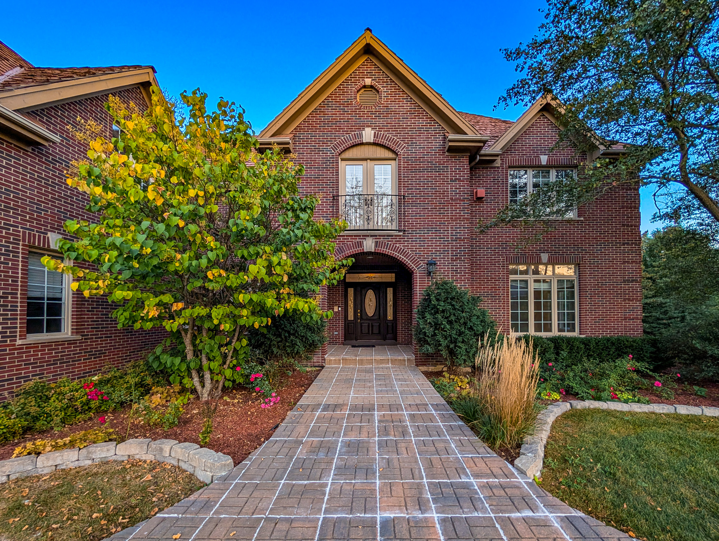 front view of a house with a yard