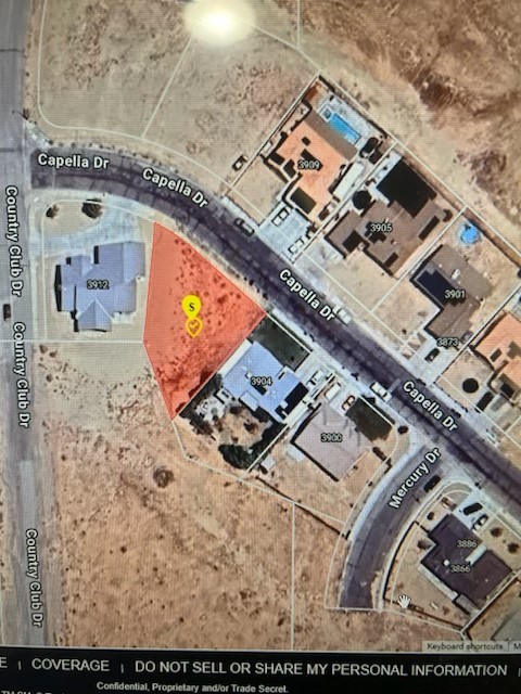 an aerial view of a house with a ocean view