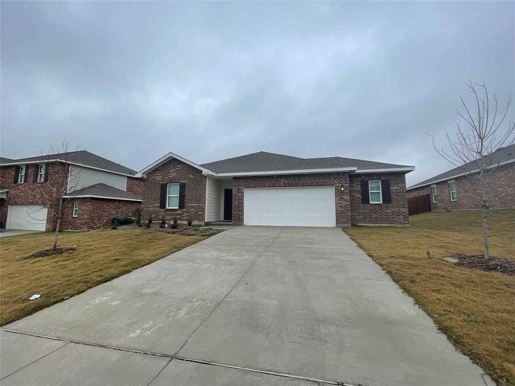 front view of a house with yard