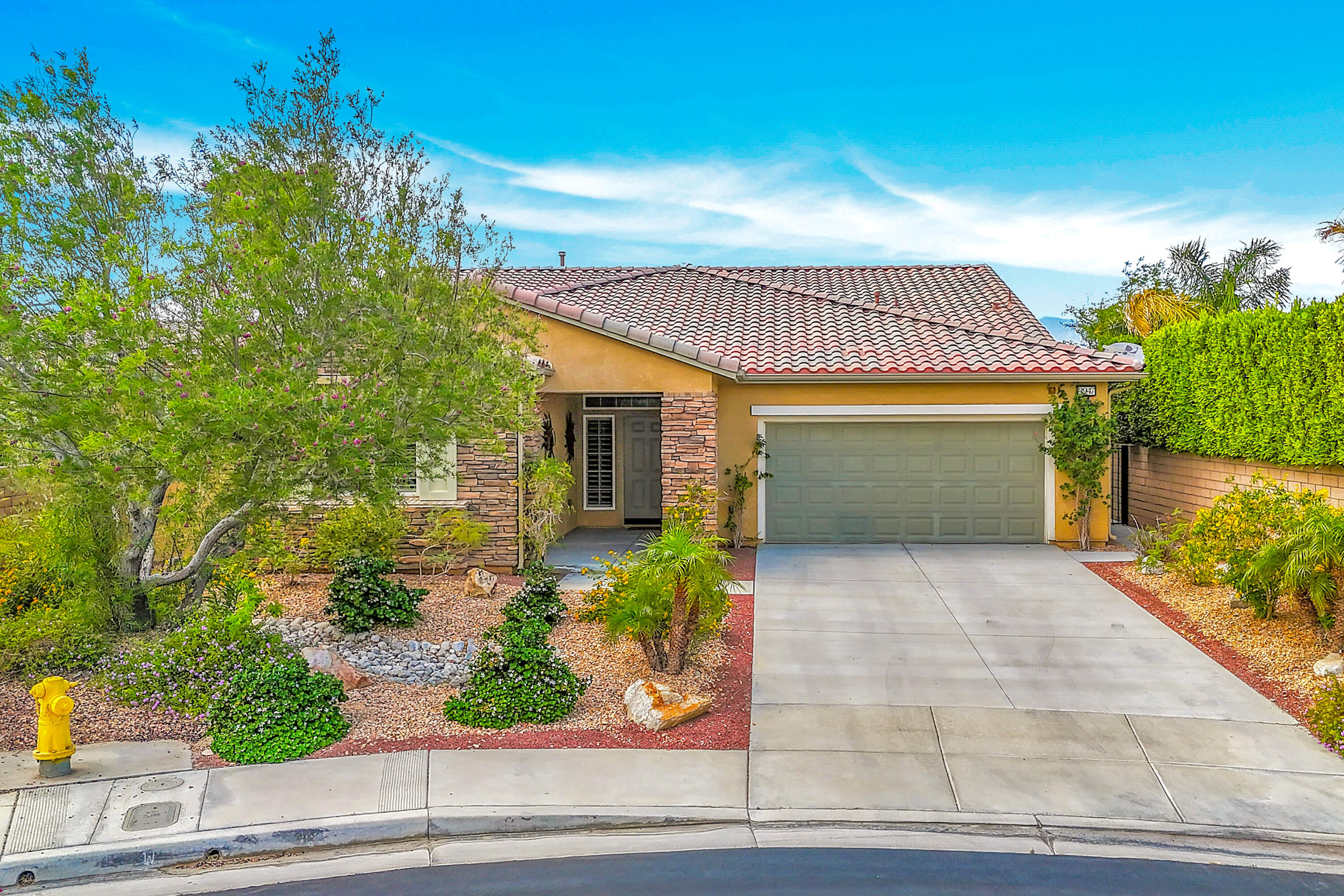 front view of a house with a garage