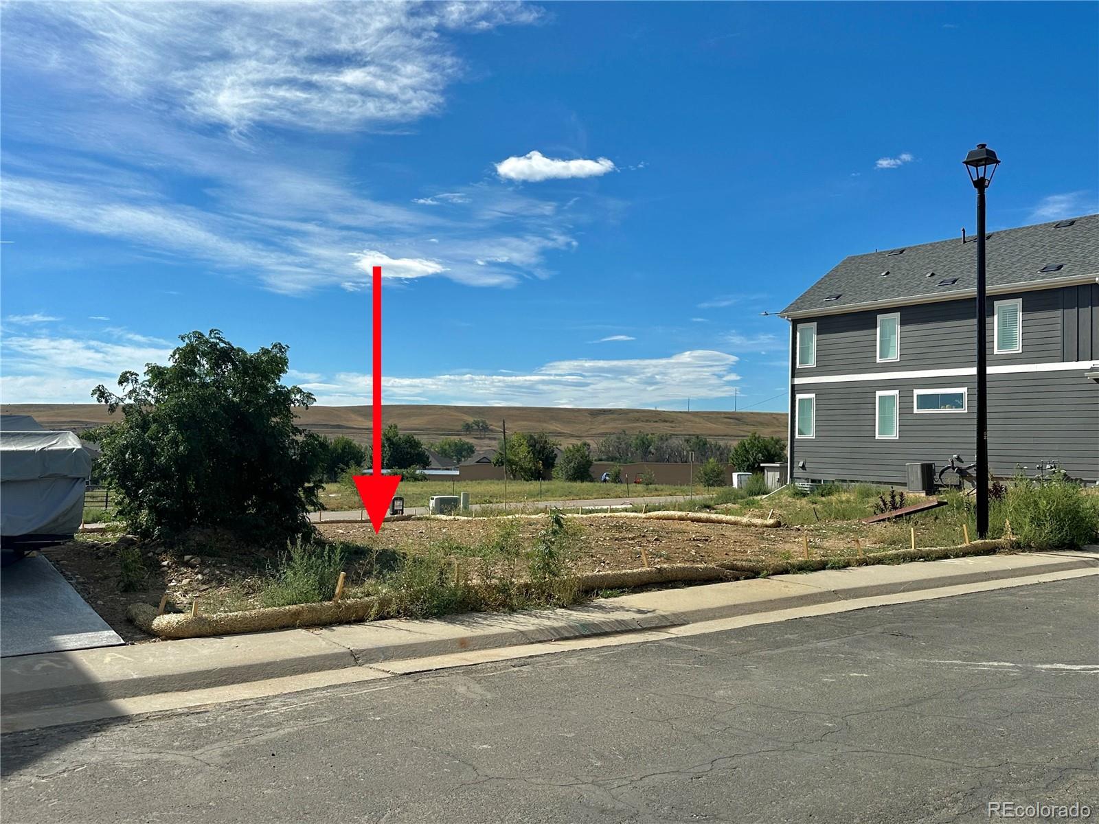 a view of a house with a street