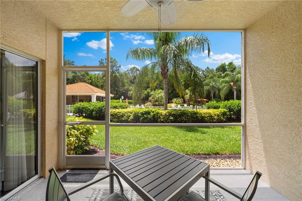 a view of a room with a patio and garden