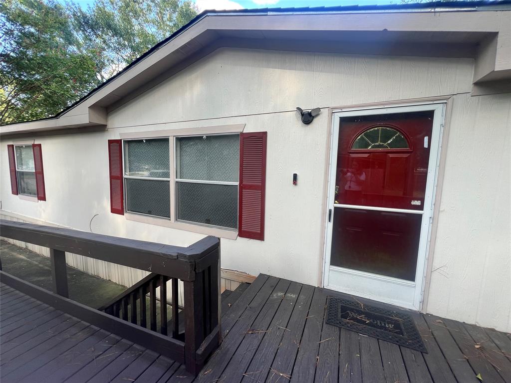 a view of balcony with a deck