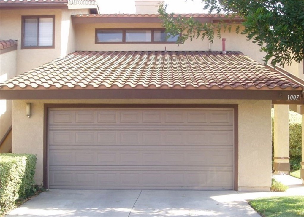 a front view of a house having yard