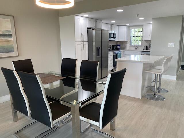 a view of a dining room with furniture