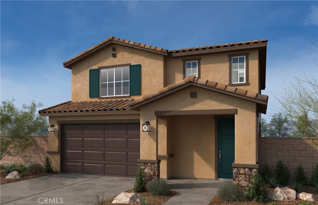 a front view of a house with a garage