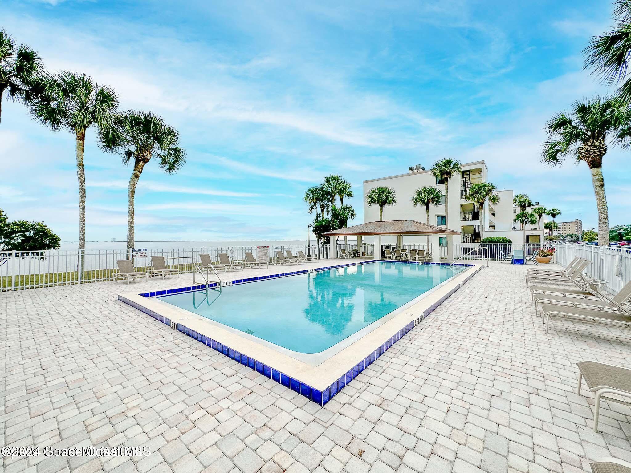 swimming pool with outdoor seating