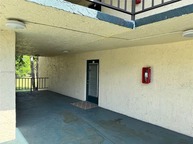 $124,999 | 9070 Lime Bay Boulevard, Unit 212 | Woodland Lakes