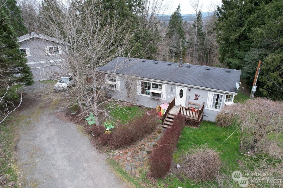 a aerial view of a house with garden