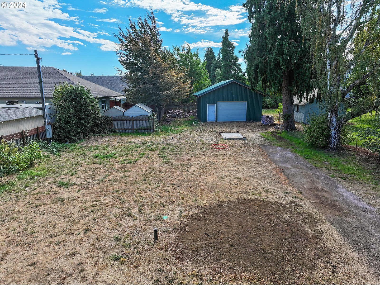 a house view with a backyard space