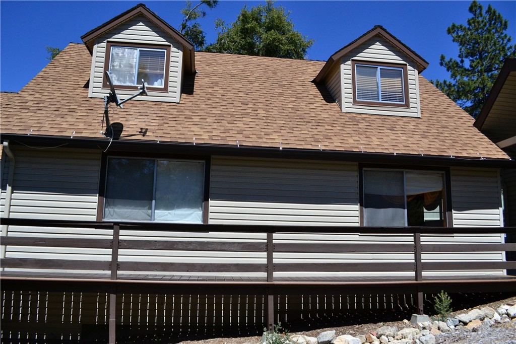 a front view of a house with a balcony