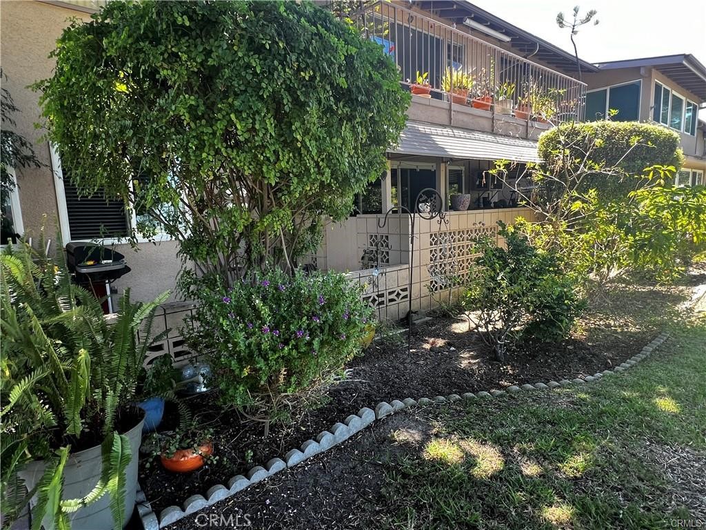 a view of a house with a garden