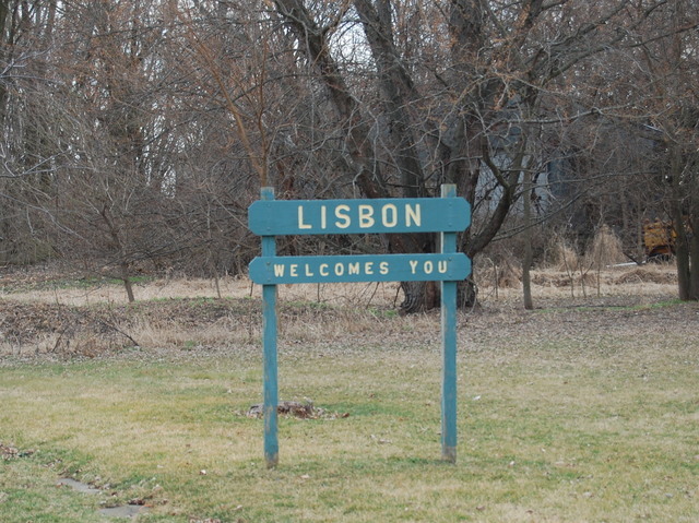 a sign on the side of a road