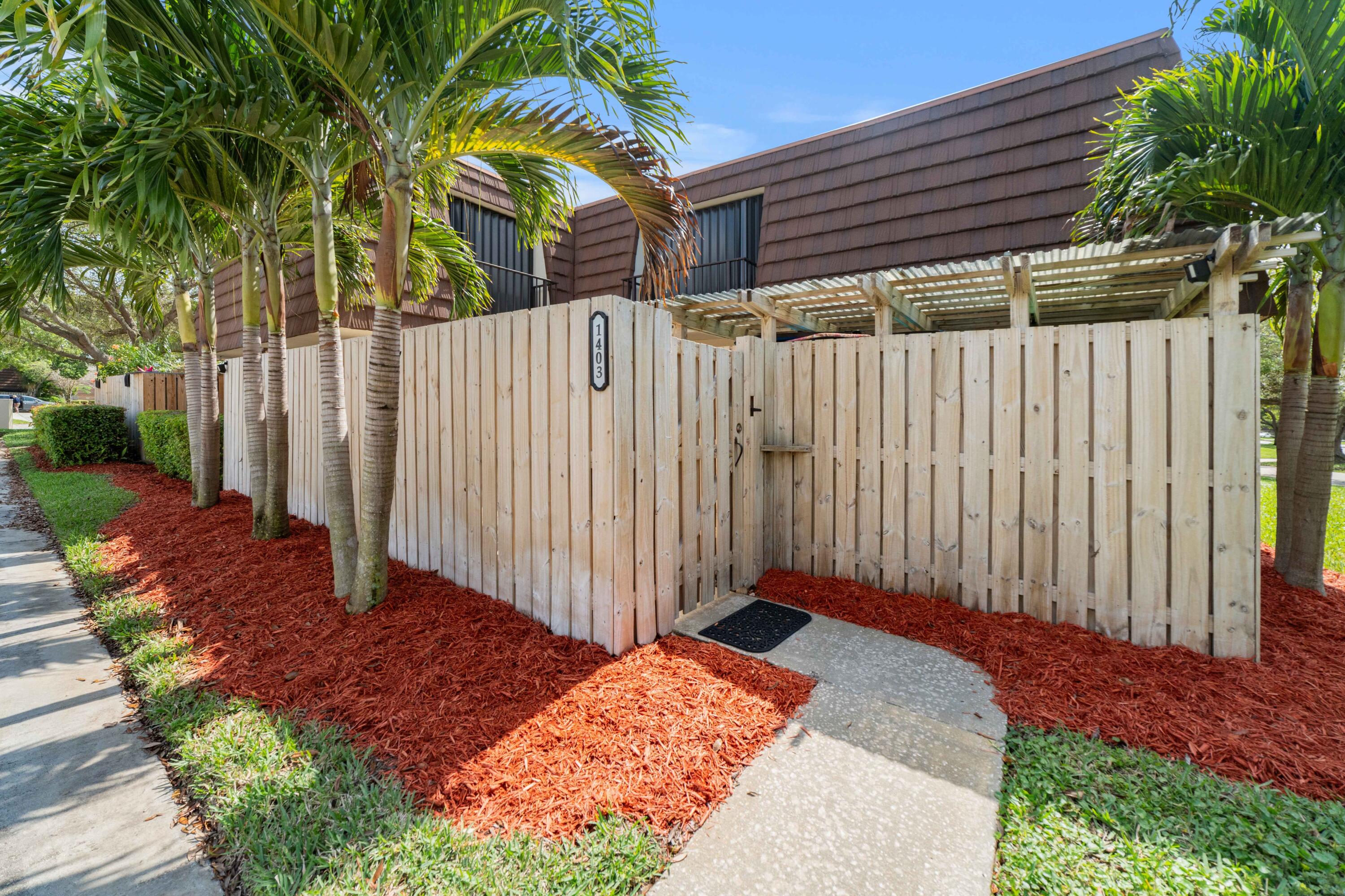 a view of a backyard with a garden