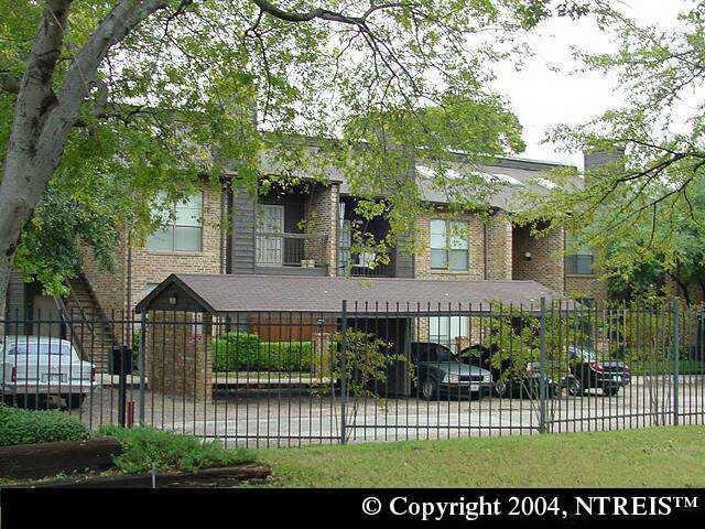 front view of a house with a garden