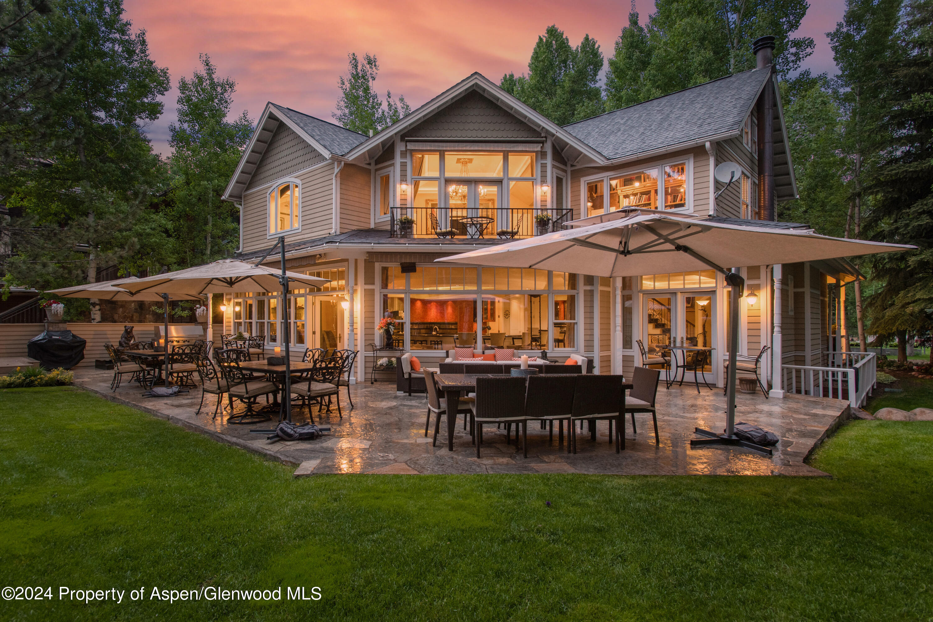 a view of a house with a yard porch and sitting area