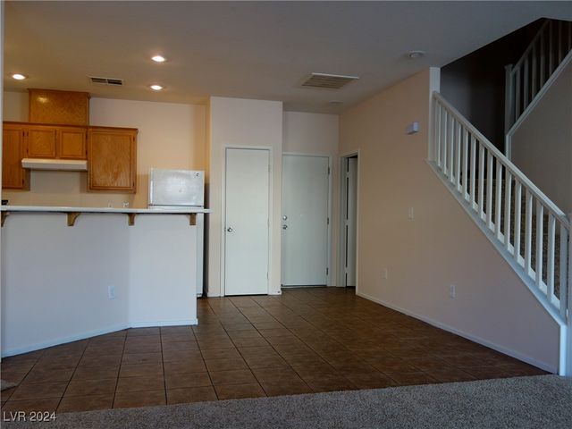 $299,999 | 3928 Lazy Pine Street, Unit 103 | Desert Pines Condominium Merger