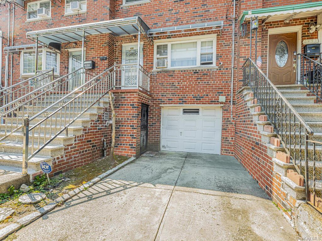 Entrance to property with a garage