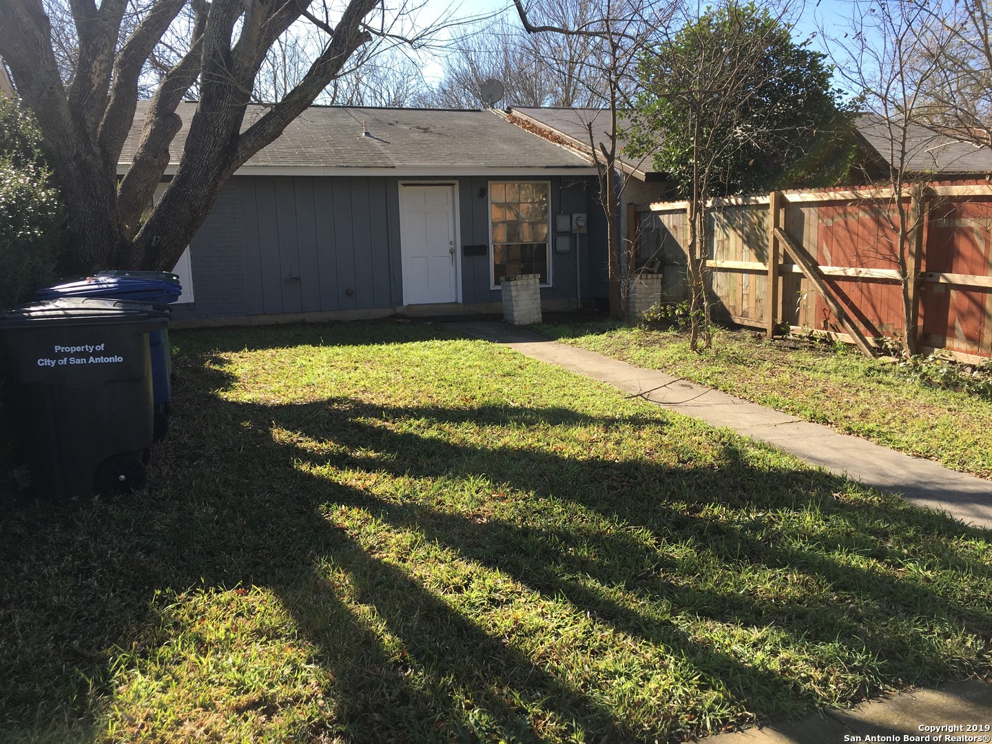 a view of a backyard of the house