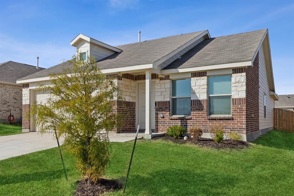 front view of house with a yard