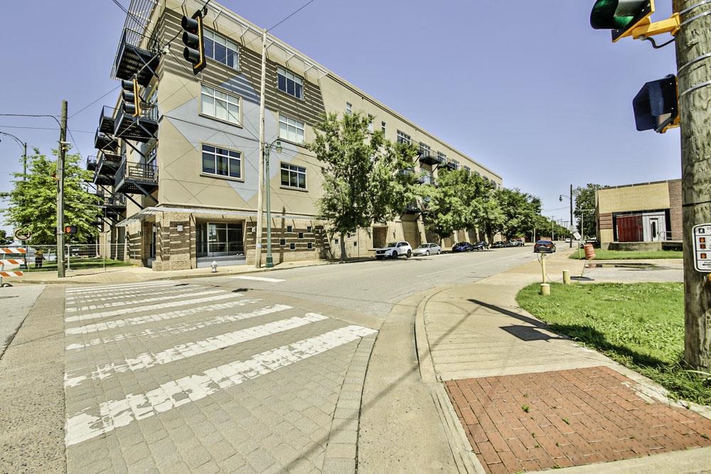 a view of a building with a street