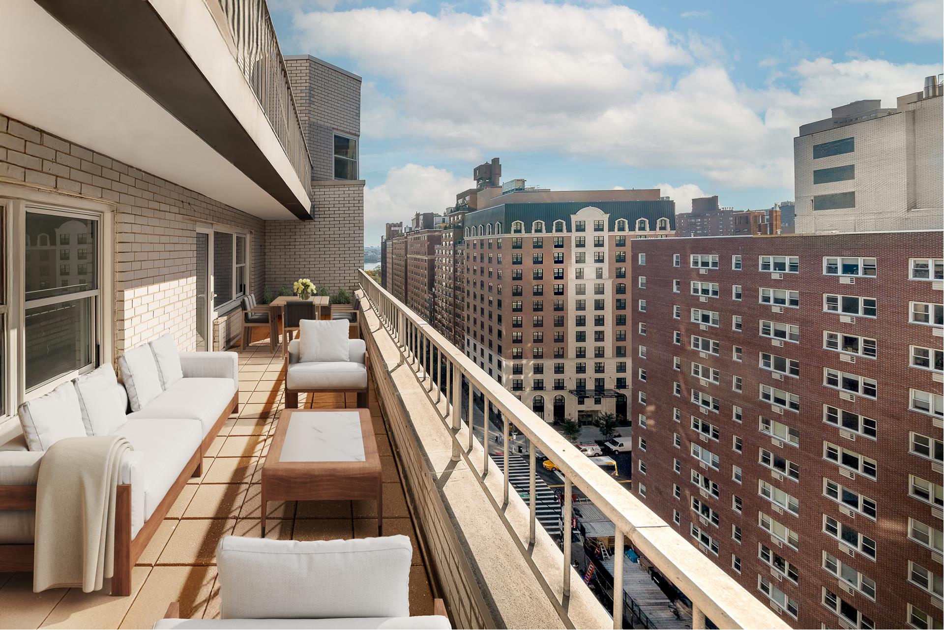 a view of balcony with furniture