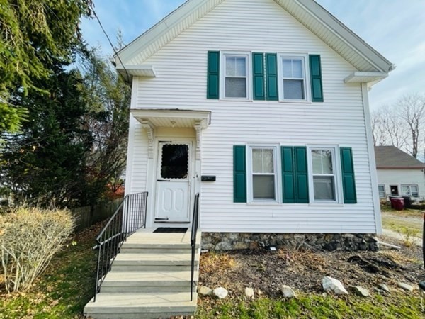 a front view of a house with a porch