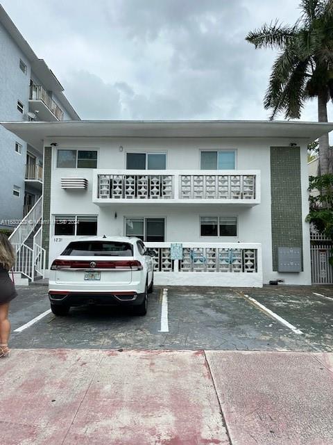 a view of house with outdoor space