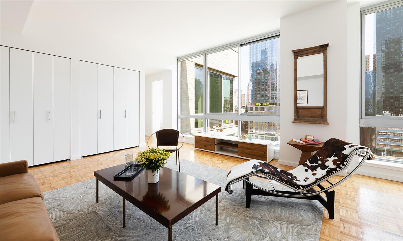 a living room with furniture and a table