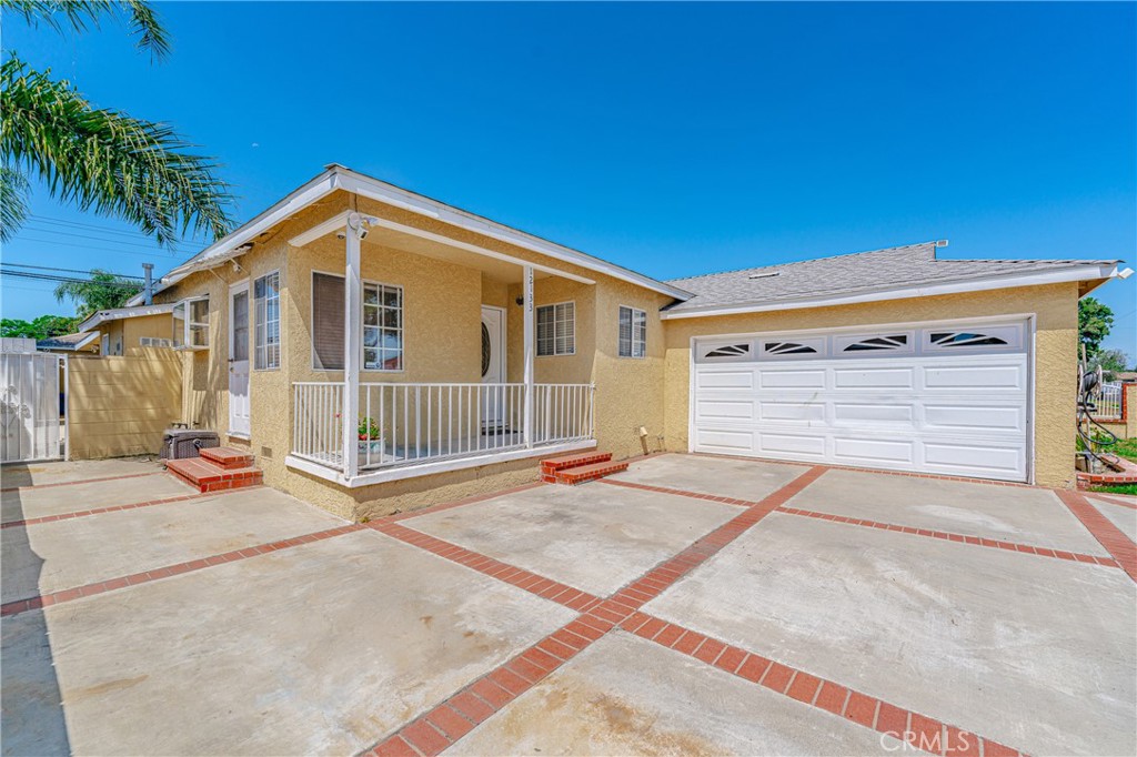 a front view of a house with a garage