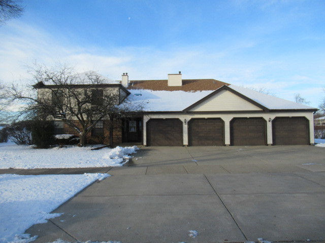 a view of a house with a street